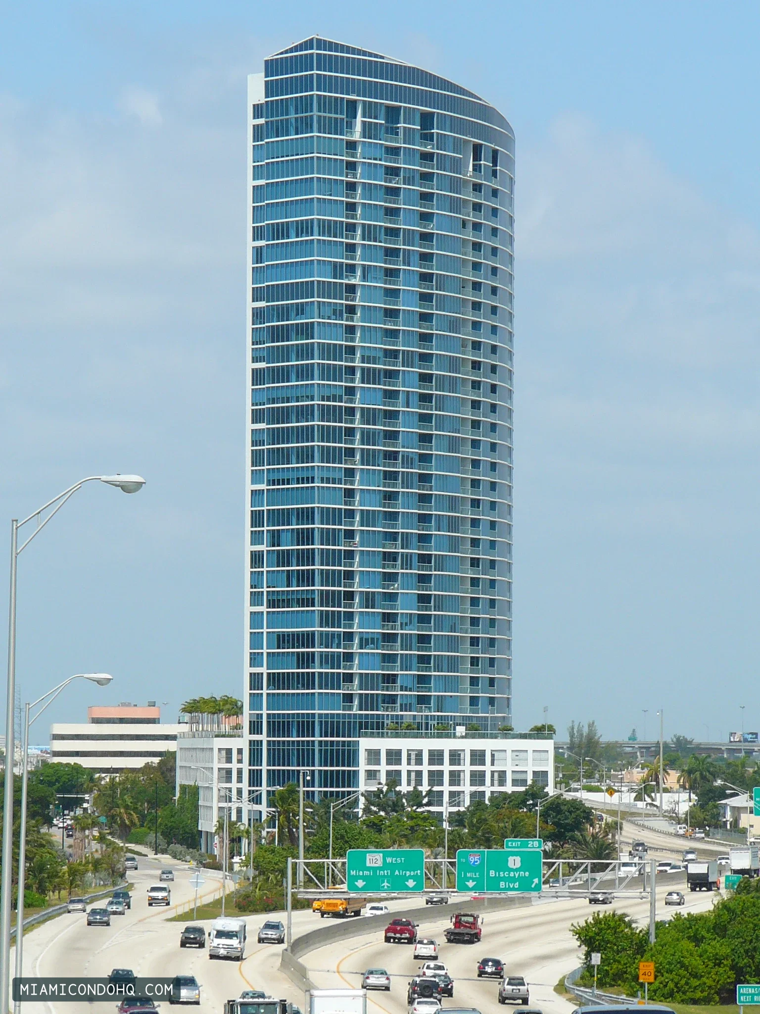 Blue on the Bay’s curved glass tower, photographed on May 16, 2008.