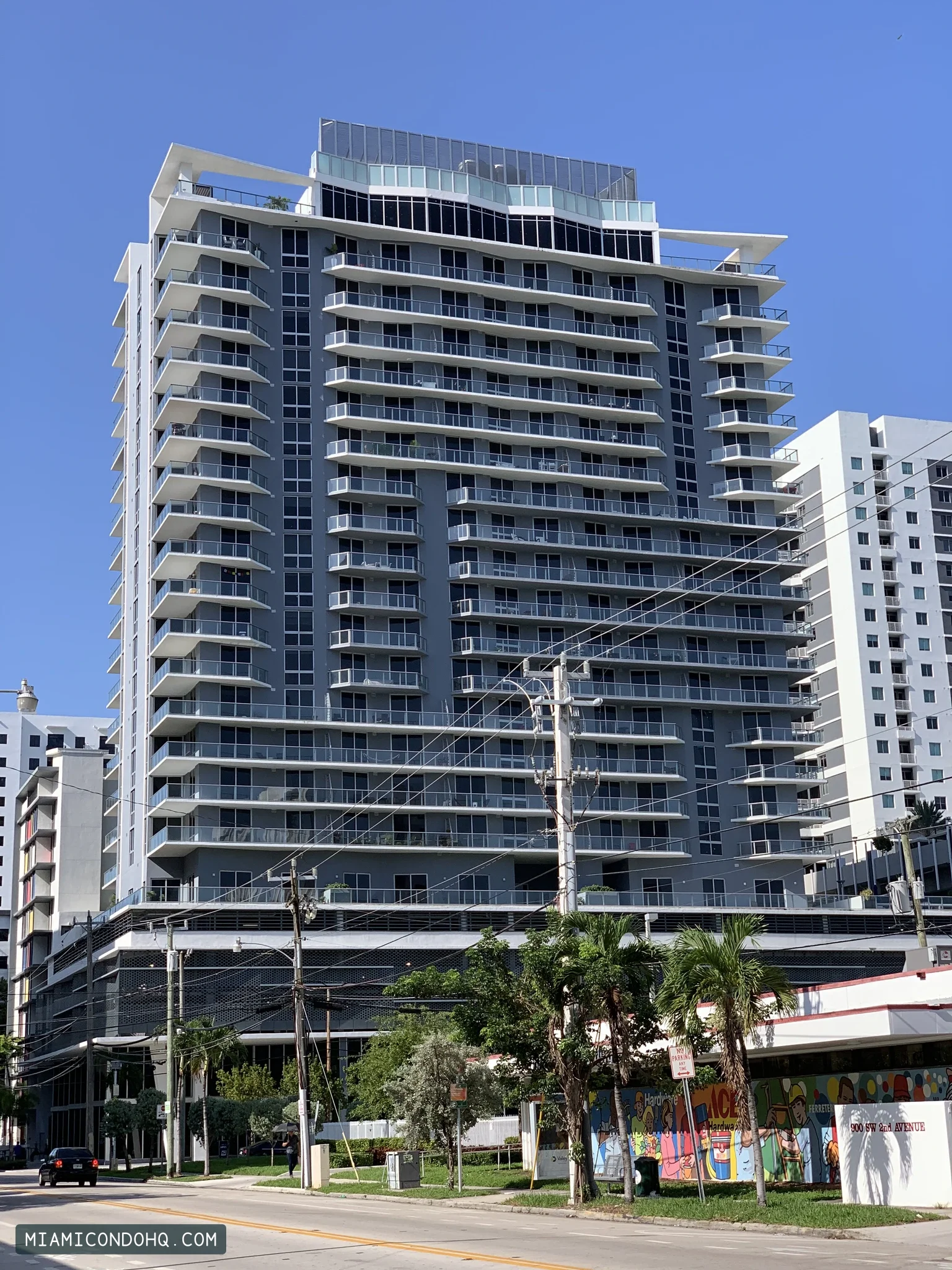 Brickell Ten’s gray facade and projecting balconies, photographed in June 2019.