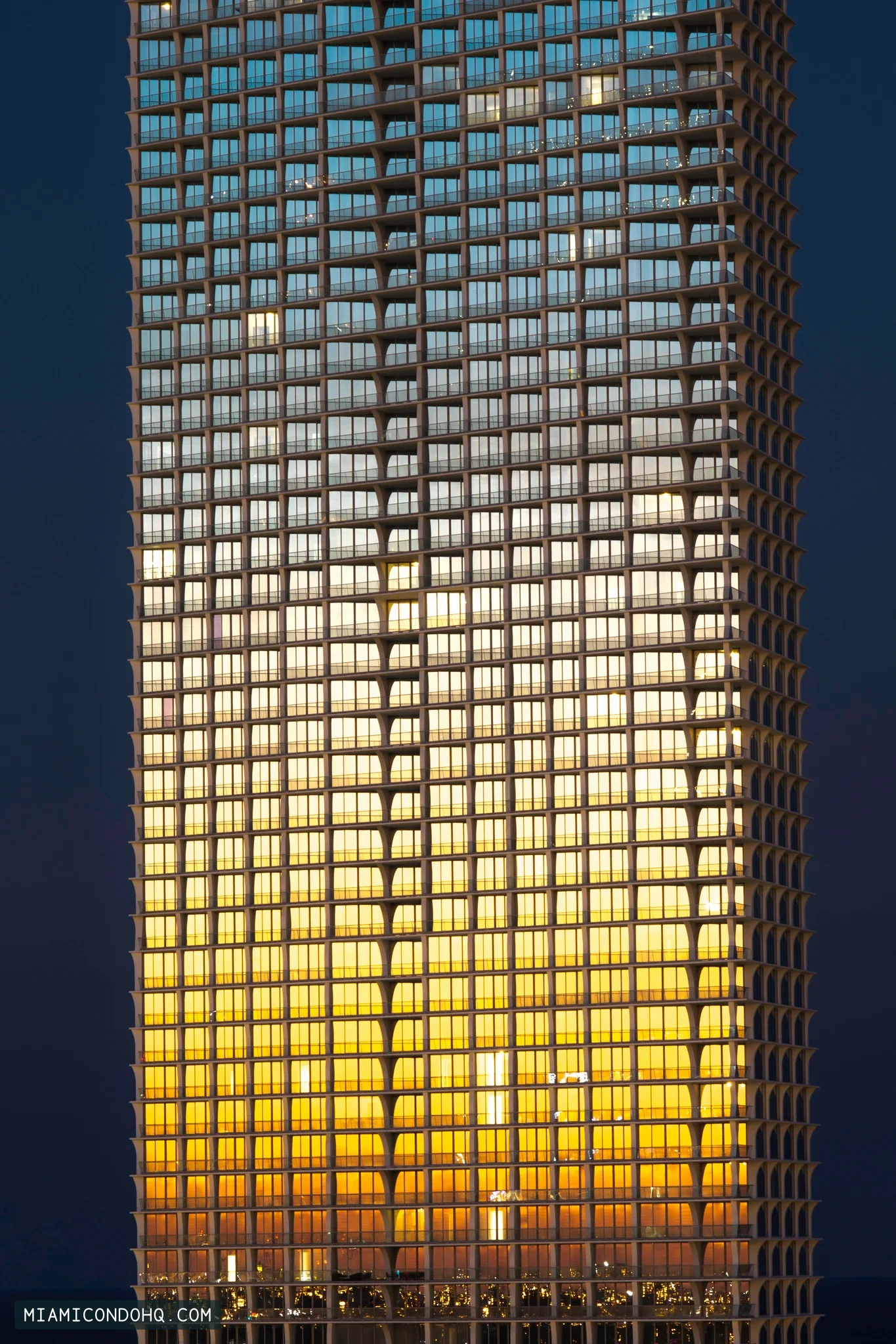 Evening light reflected in Jade Signature’s facade on March 14, 2018.
