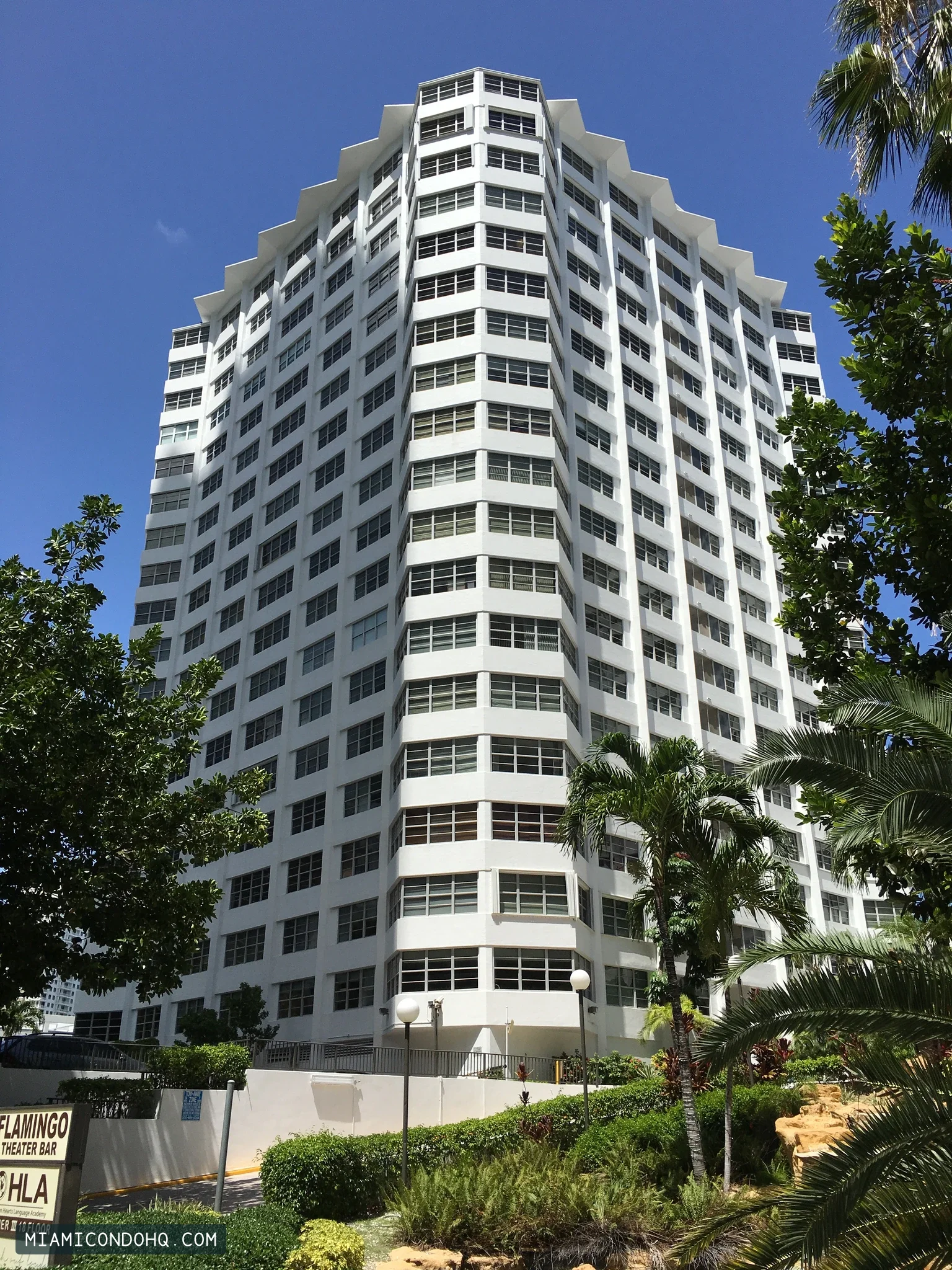 An angular tower facade at the Four Ambassadors community, photographed in July 2016.